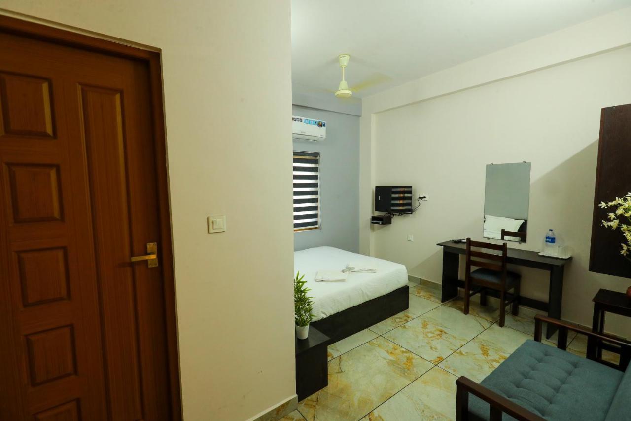 فندق Aldora Airport Residency نيدومباسيري المظهر الخارجي الصورة